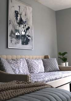 a living room with a couch and a bed at Schaefer Ridge Apartments, Branson