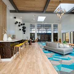 a lobby area with chairs and tables at Presidio Palms Apartments, Tucson, AZ, 85701