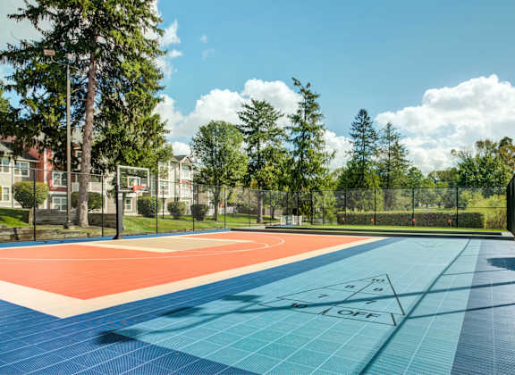 A tennis court with the word LOFT written on it.