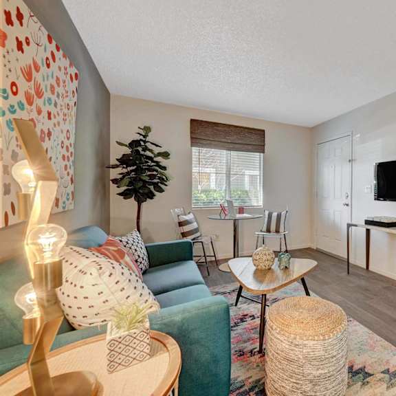 Living Room With TV at Solstice Apartment Homes, Nevada, 89108