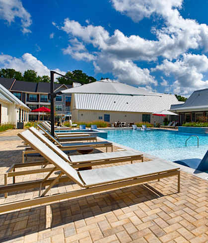 the resort style swimming pool at the resort at governors residence at Farmhaus Apartments, Alabama, 35757