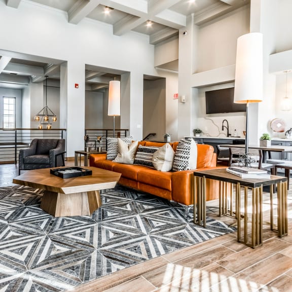 a living room with a couch and a table at The links at Plum Creek Apartments, Castlerock, CO