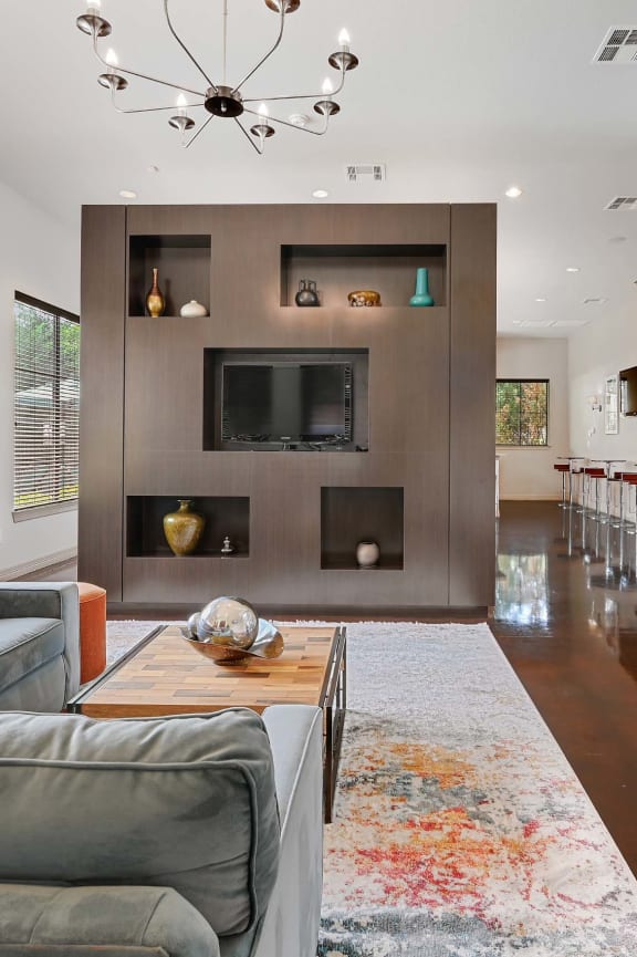 a living room with a couch and a table