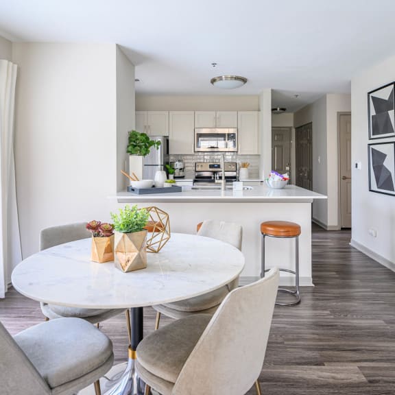 a living room with a couch and a chair at Ashford Green, Charlotte, 28262