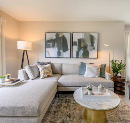 a living room with a couch and a coffee table at Ashford Green, North Carolina