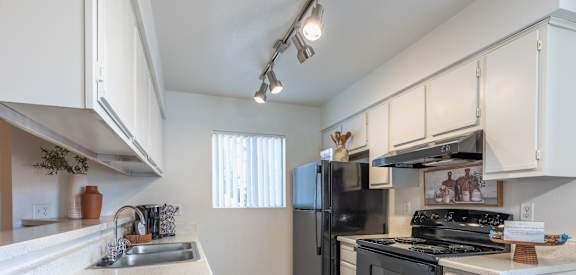 Kitchen at Sunset Winds Apartments in Henderson, NV 89014