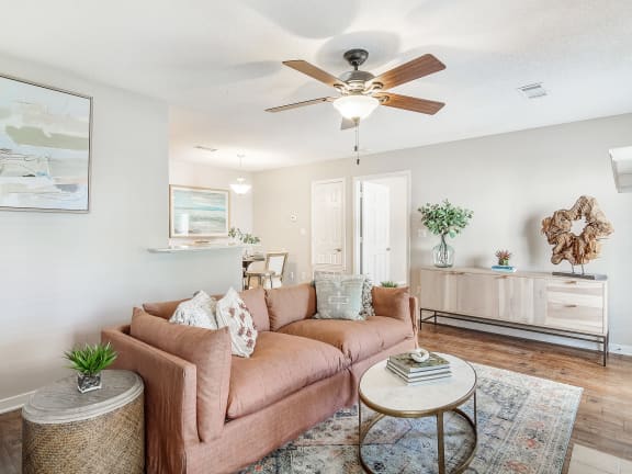 a living room with a couch and a ceiling fan at Reserve of Jackson Apartment Homes, Jackson, MS, 39211