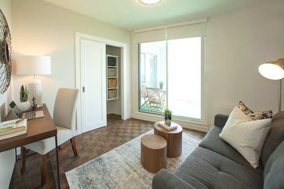 a living room with a couch and a table