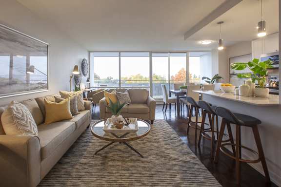 a living room with a couch and a table