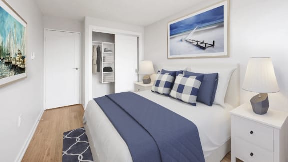 a bedroom with a bed and a closet