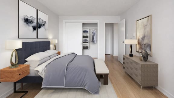 a bedroom with a bed and a dresser