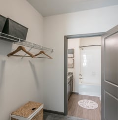 a closet with a television and a door to a bathroom at Village at Westland Cove Apartments, Knoxville, TN, 37922
