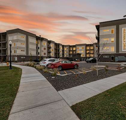 A car is parked in front of a building named "Beverly Cove".