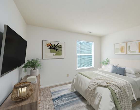 A bedroom with a bed, a nightstand, a lamp, a plant, and a painting on the wall.
