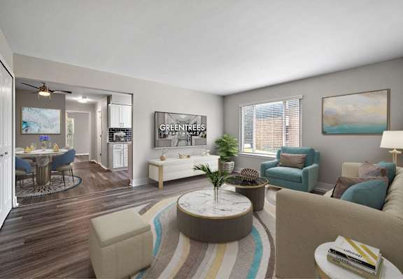 A living room with a sofa, chairs, and a coffee table.