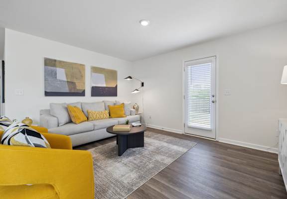 a living room with a couch and a coffee table