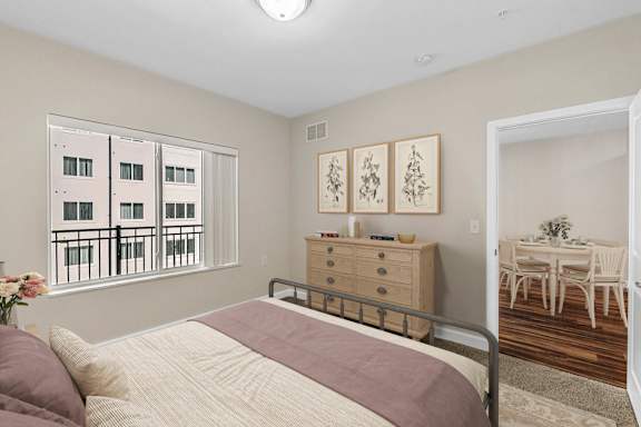 A Bedroom with a Bed at Anchor at Gulf Harbors 62+ Apartments, New Port Richey, FL, 34652