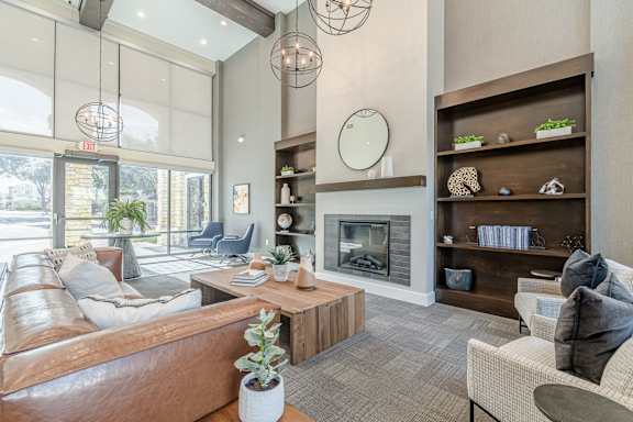 a bedroom with a bed and a ceiling fan at Woodway Village, Austin