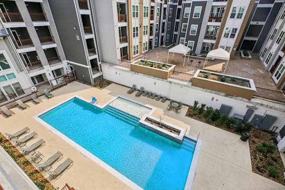 Aerial View of Shimmering Pool at Harrisburg Lofts, Houston, TX