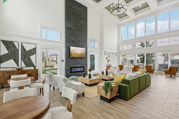 Living Room with fireplace and seating at Harrisburg Lofts, Texas, 77003