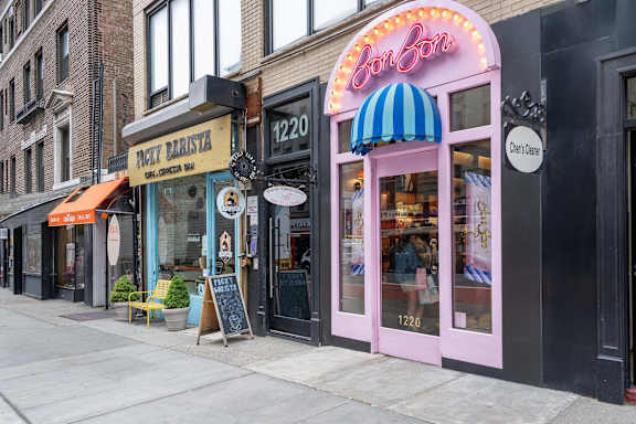 A row of shops on a city street.