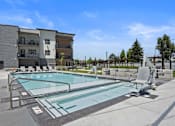 Thumbnail 57 of 74 - Swimming Pool And Relaxing Area at The Flats at Riverwoods, Utah