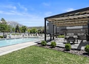 Thumbnail 58 of 74 - Backyard with a Pool at The Flats at Riverwoods, Utah, 84604