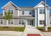 Thumbnail 1 of 6 - a large house with a sidewalk in front of it