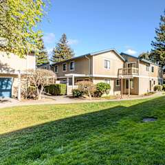 exterior of apartment building and landscaping at Redwood Landing Apartments, California
