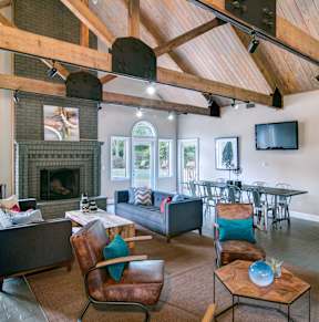 A living room with a fireplace and a couch.