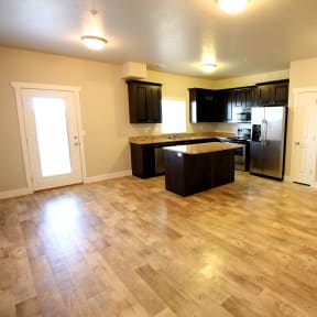 an open concept kitchen and living room