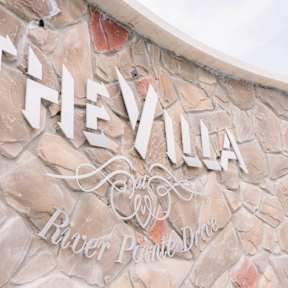 Property Sign at The Villa at River Pointe, Maumelle