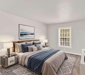 a bedroom with a bed and a tv
