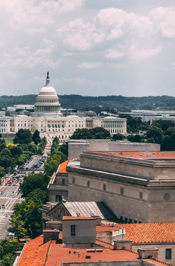 a view of the capitol building from above the city