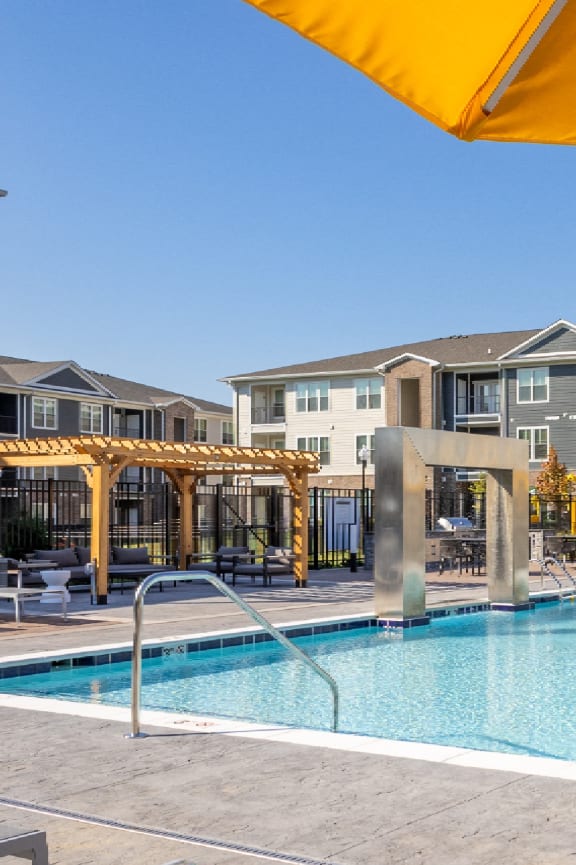 Swimming Pool And Relaxing Area at Arbour Place Apartments, Jeffersonville, IN, 47130