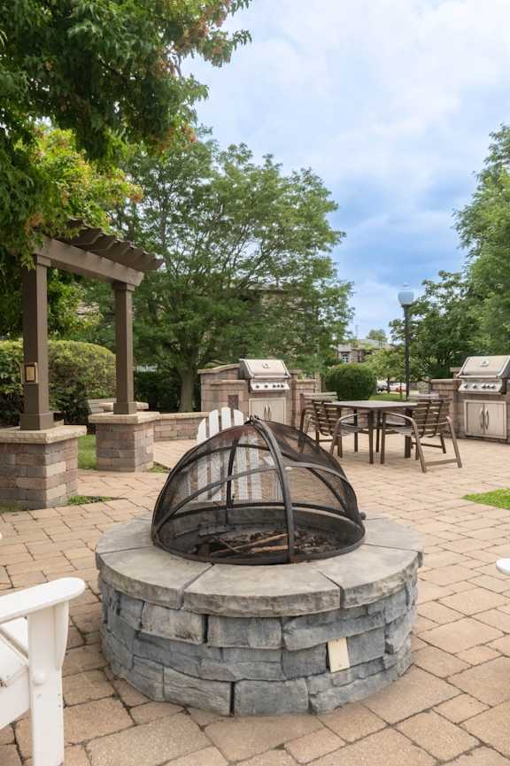 Outdoor Fireplace at TLC Grand Apartments, Deerfield, IL 60015