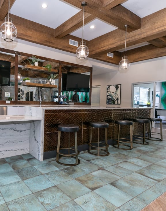 a large kitchen with a large island and a tv at Willowest in Collier Hills in Atlanta, GA