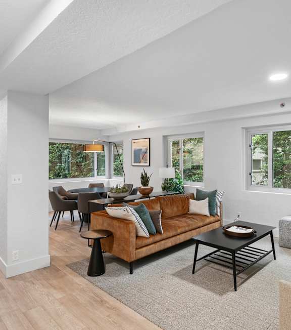 a living room with a couch and a table