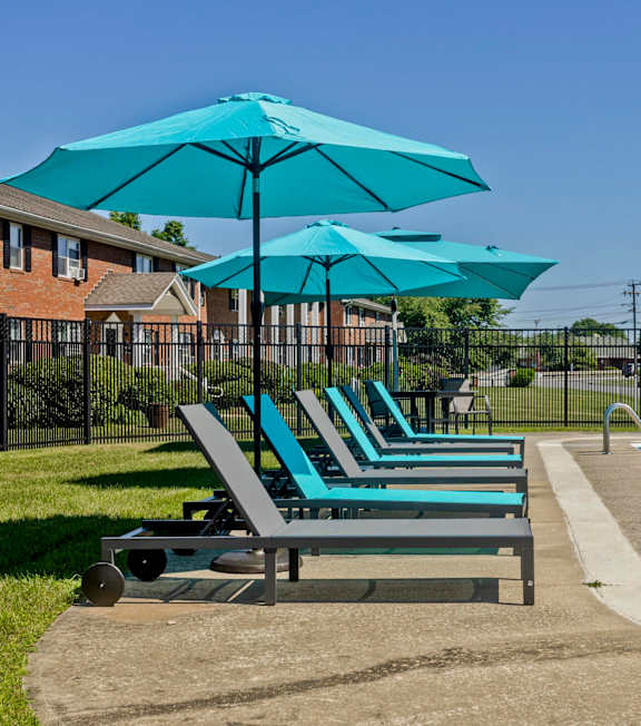 Swimming pool with umbrellas and chaise longues at Hawkins Meadow in Amherst, MA, 01002