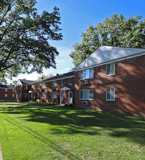 View from the tree-lined street at Morgan Park Apartments in Euclid, OH