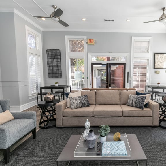 a living room with a couch and a coffee table at Roswell Village in Roswell, GA