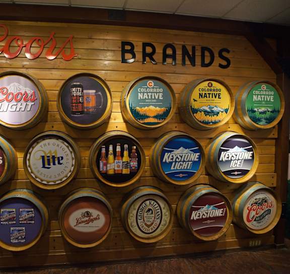 A wall of Coors beer brand logos. at Miners Mesa Apartments, Golden, CO, 80401