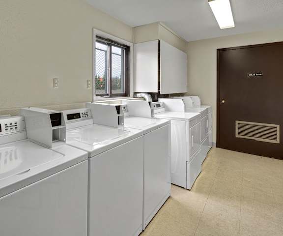 Laundry room at Arbor Pointe Apartments. 