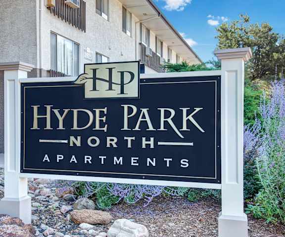 The exterior sign and building of Hyde Park North Apartments. 