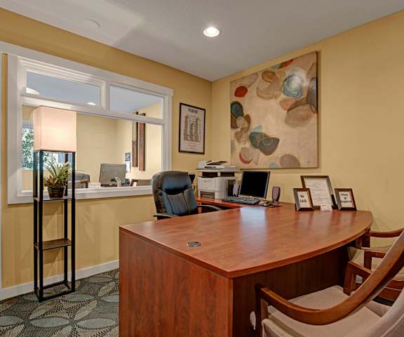 Hyde Park Leasing Office Desk The leasing office with a desk and chairs at Hyde Park.