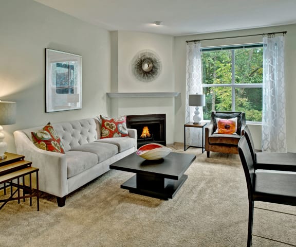 Portsmith Living Room with Fireplace Apartments in Everett, WA
