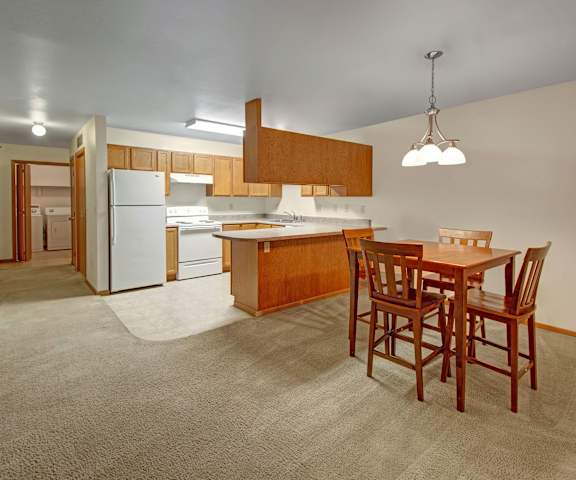 Kitchen and Dining Room at Dakota Apartments. Apartments for rent in Stanley, ND