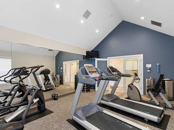 the gym with cardio equipment at Oriel Apartments