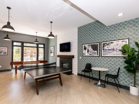 a living room with a couch and a coffee table at Willowest in Collier Hills in Atlanta, 30318