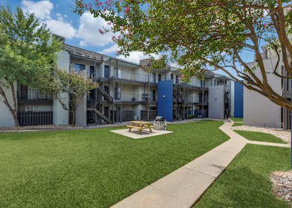 Green lawn at Mission James Place Apartments in Austin Texas